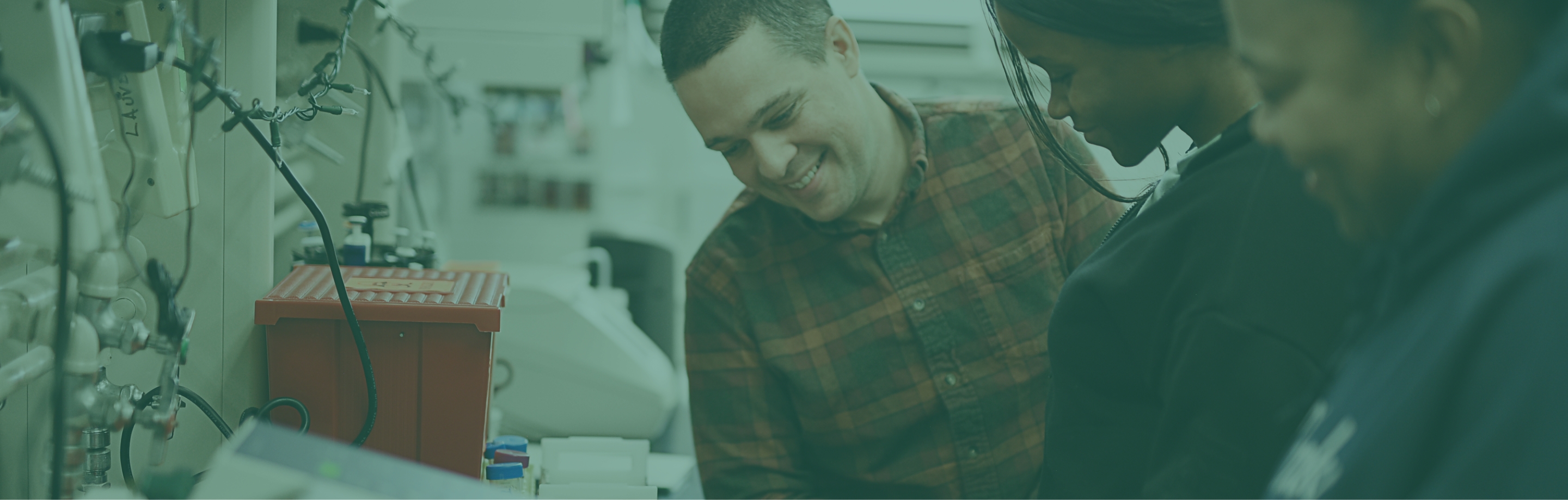 3 people working in a lab environment
