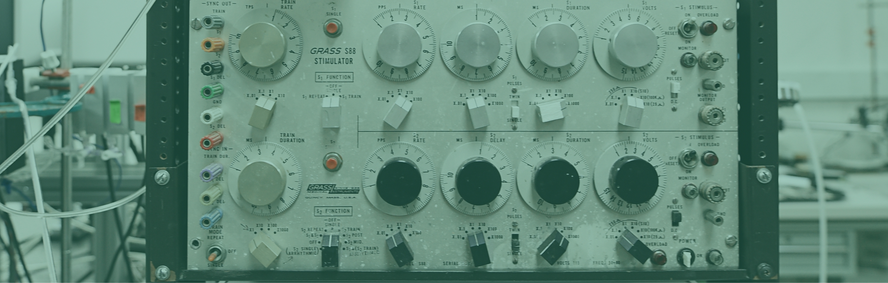 lab equipment with several dials